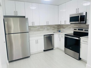 3561 Pine Needle Dr in Greenacres, FL - Building Photo - Building Photo