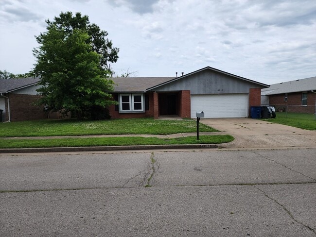 property at 13912 E 15th St