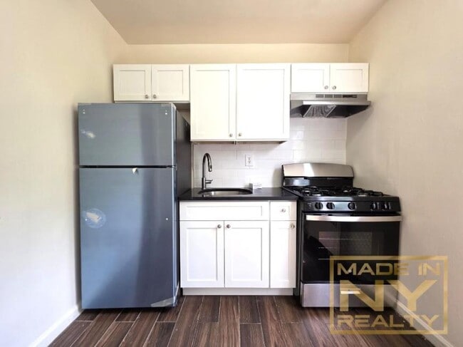 property at 36-21 213th St