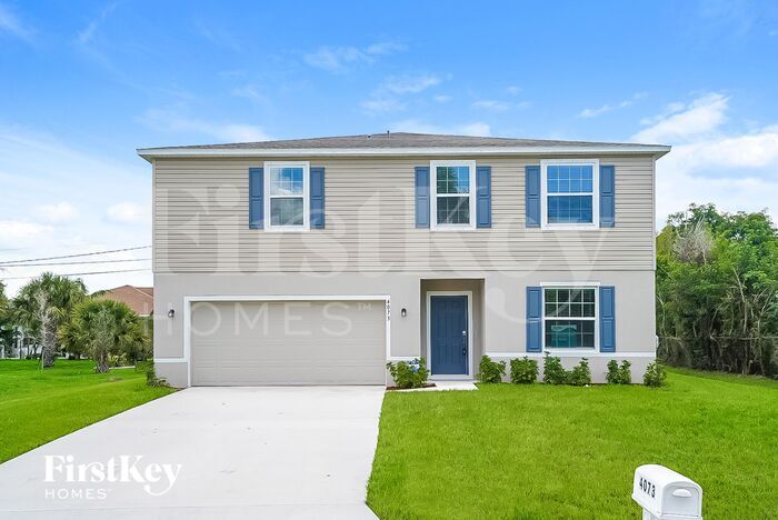 4073 SW Jaqust St in Port St. Lucie, FL - Building Photo