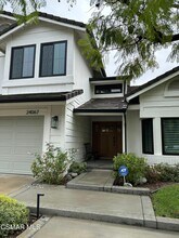 24067 Arminta St in Los Angeles, CA - Building Photo - Building Photo