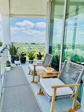 2000 Metropica Way, Unit 1203 in Sunrise, FL - Building Photo - Building Photo