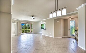 17451 Old Harmony Dr, Unit 102 in Ft. Myers, FL - Foto de edificio - Building Photo