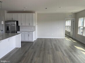 12880 Mosaic Pk Wy-Unit -1-N in Herndon, VA - Building Photo - Building Photo