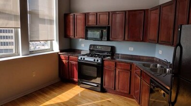 2107 Grand Blvd, Unit Western Auto Lofts in Kansas City, MO - Building Photo - Building Photo