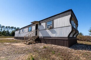 125 Rd 5814 in Cleveland, TX - Building Photo