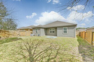 7642 Dusty Melody Ln in Conroe, TX - Building Photo - Building Photo