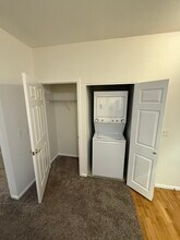 2896 W Riverwalk Cir, Unit #A110 in Littleton, CO - Foto de edificio - Building Photo