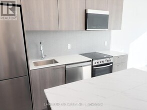 7439 Kingston Rd in Toronto, ON - Building Photo - Building Photo