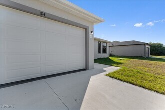1134 Cummings St E in Lehigh Acres, FL - Building Photo - Building Photo