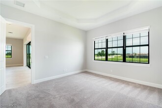 15244 Zeno Wy-Unit -201 in Naples, FL - Building Photo - Building Photo