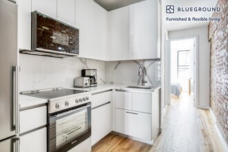 248 Elizabeth St in New York, NY - Building Photo - Building Photo