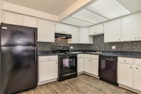 Building Photo - Asbury Plaza Apartamentos in Denver, Colorado