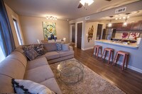 Living Room - Palisades at Pleasant Crossing Apartments in Rogers, Arkansas