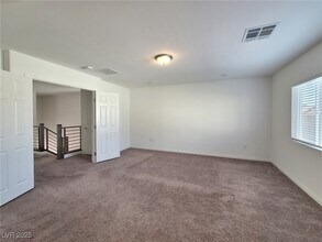 7736 S Westwind Rd in Las Vegas, NV - Building Photo - Building Photo