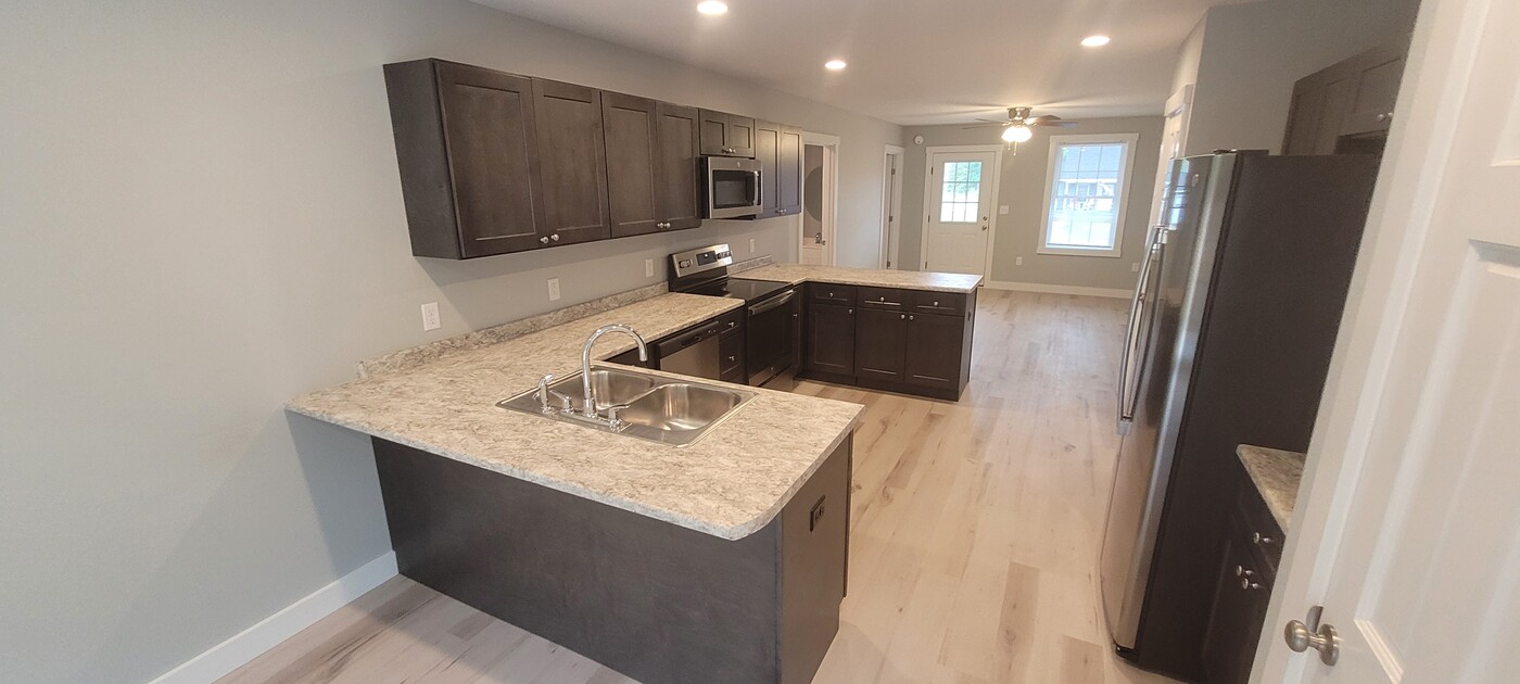 104 Canaan Rd, Unit 54 in Hampden, ME - Foto de edificio