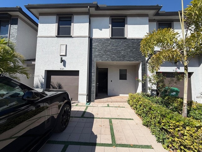 property at 9143 NW 161st St