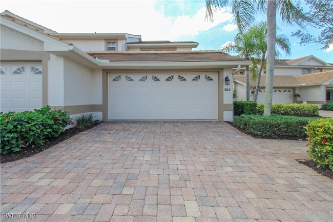 5645 Whisperwood Blvd in Naples, FL - Foto de edificio - Building Photo