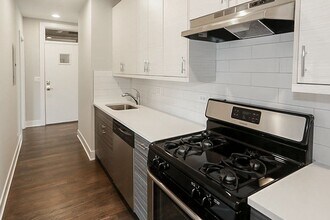 3919 N Janssen Ave, Unit 3919-3E in Chicago, IL - Foto de edificio - Building Photo