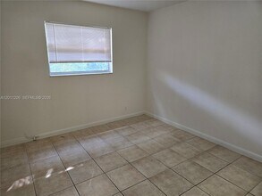 8704 NW 35th St, Unit 105 in Coral Springs, FL - Building Photo - Building Photo