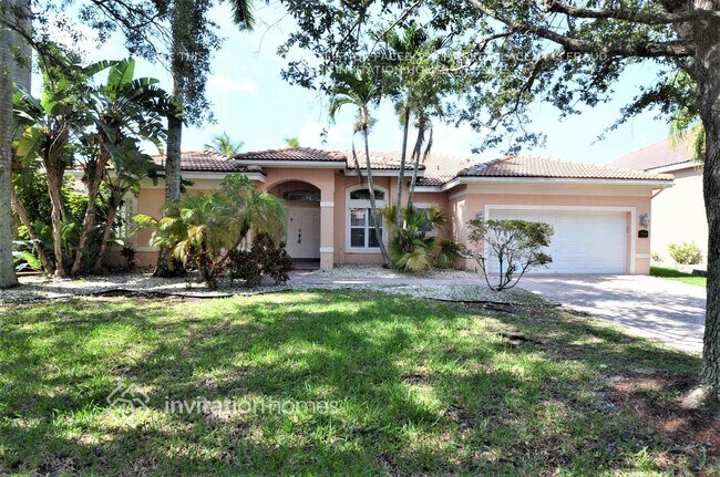 10240 NW 52nd St in Coral Springs, FL - Foto de edificio - Building Photo