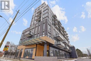 7439 Kingston Rd in Toronto, ON - Building Photo