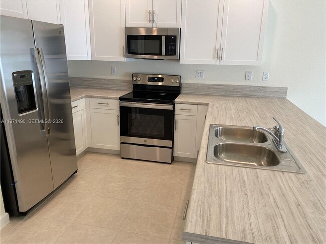 property at 11379 W 34th Wy.