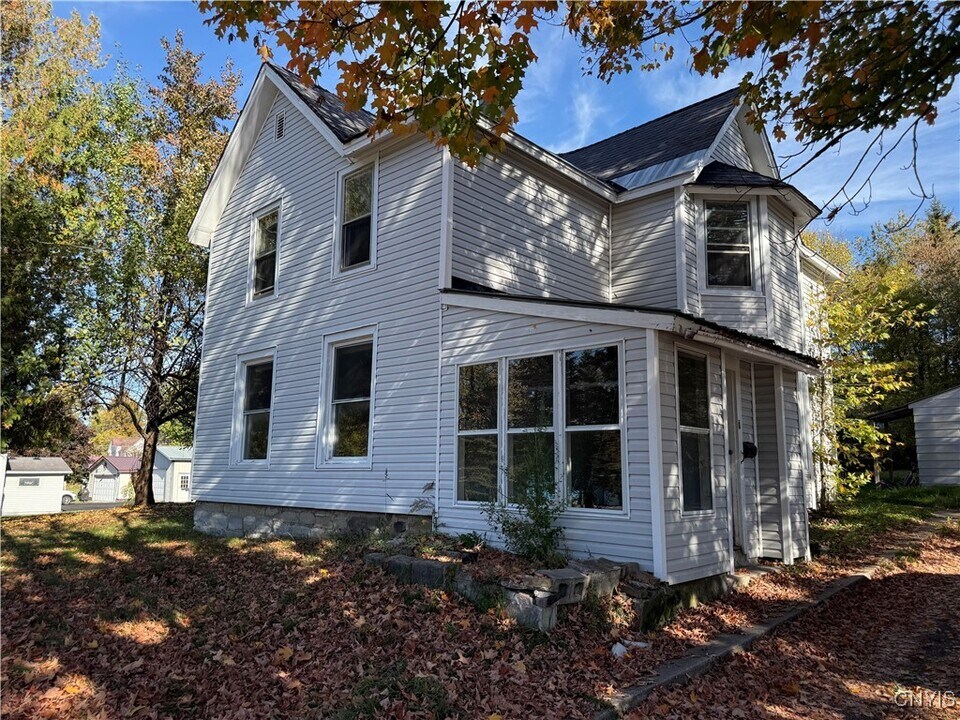 7 Potter St in West Carthage, NY - Building Photo