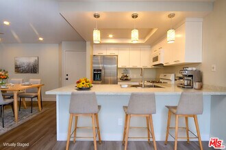 6820 Remmet Ave in Los Angeles, CA - Building Photo - Building Photo