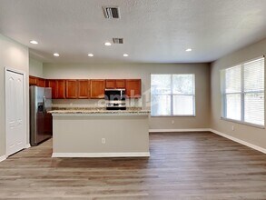 7729 Grasmere Dr in Land O Lakes, FL - Building Photo - Building Photo