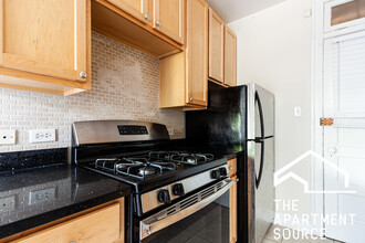 1251 W Henderson St, Unit 2 in Chicago, IL - Building Photo - Building Photo