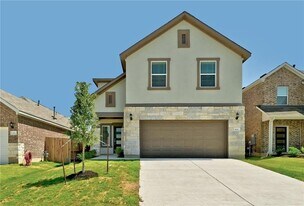 806 Pepperbark Loop in Mustang Ridge, TX - Building Photo