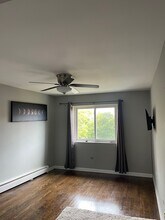 6827 W Raven St, Unit 2L in Chicago, IL - Building Photo - Building Photo