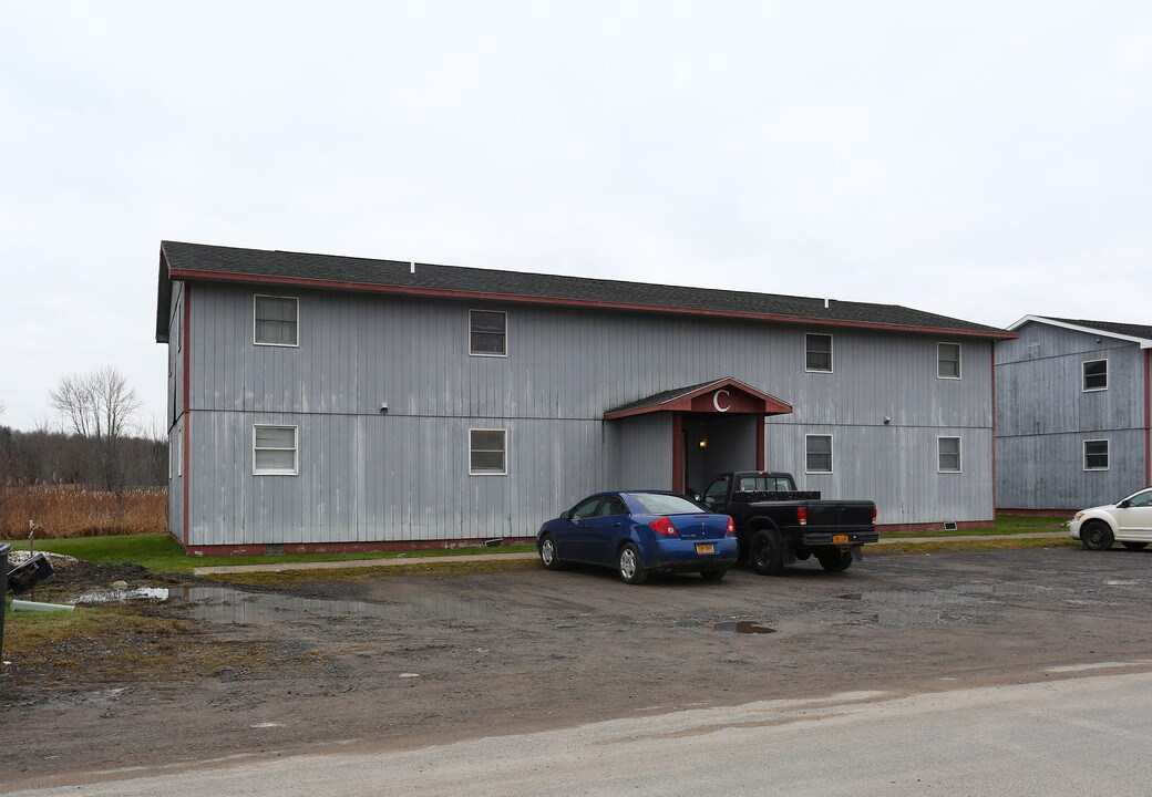 Bay Creek Apartments in Central Square, NY - Building Photo