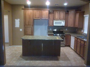 14118 W Country Gables Dr in Surprise, AZ - Building Photo - Building Photo