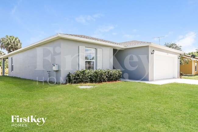1158 SW Eleuthera Ave in Port St. Lucie, FL - Building Photo - Building Photo