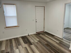 112 E Young St, Unit APT 1 in Clio, MI - Building Photo - Building Photo