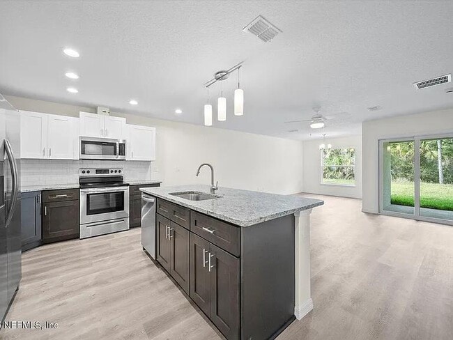 59 Wellstream Ln, Unit #A in Palm Coast, FL - Foto de edificio - Building Photo