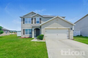 2206 Rockmart Loop in Tavares, FL - Building Photo