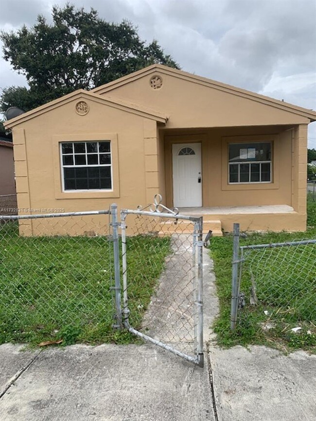 property at 6830 NW 14th Ave