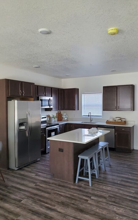 Providence Lane Townhomes in Van Meter, IA - Foto de edificio