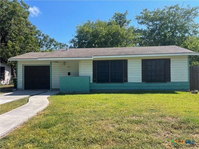 property at 1610 Travis Ave