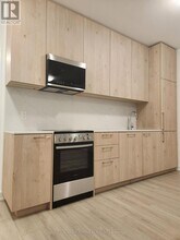 7439 Kingston Rd in Toronto, ON - Building Photo - Building Photo