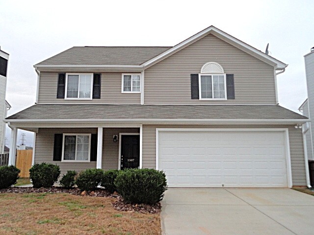 5507 Carriage Woods Dr in Browns Summit, NC - Building Photo