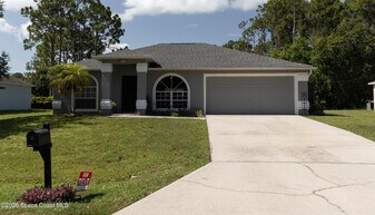 1572 Holbrook Rd NW in Palm Bay, FL - Building Photo