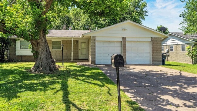 property at 11618 E 15th St