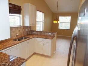 1445 Mariposa Cir in Naples, FL - Building Photo - Building Photo