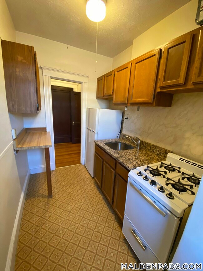 17-19 Washington St., Unit 509 in Malden, MA - Foto de edificio - Building Photo