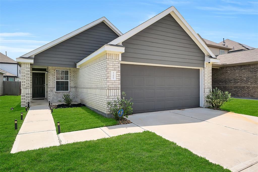 23607 Buttress Root Dr in Spring, TX - Foto de edificio