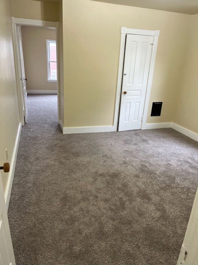 property at 211-213 N State St